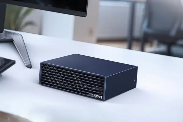 Mini AI Supercomputer NVIDIA DGX Spark 12 GIGABYTE AI Top Atom on desk